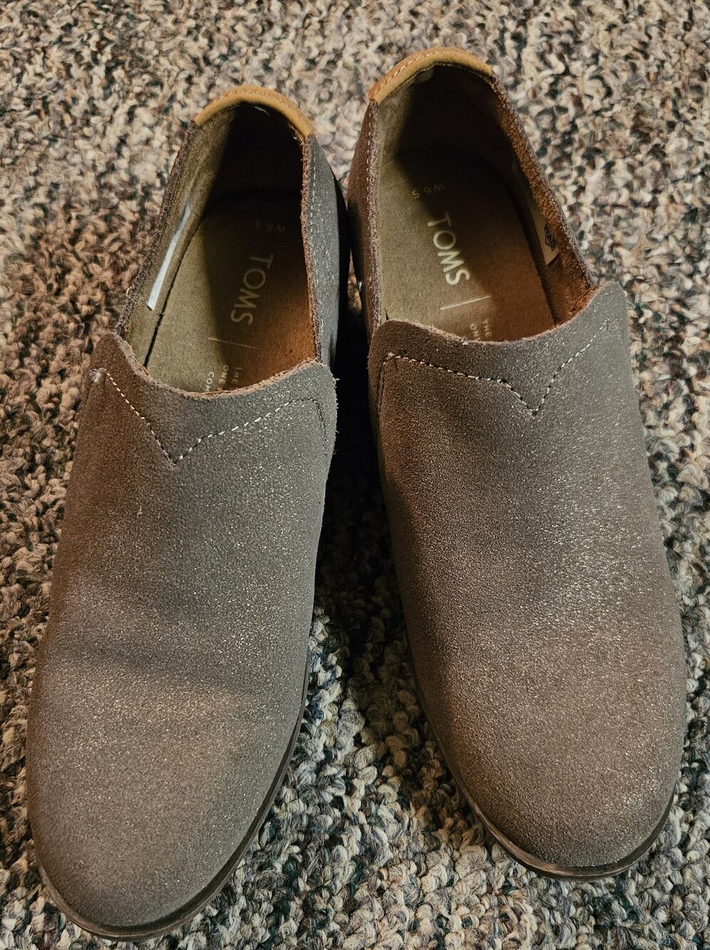 TOMS Shaye low booties in a shimmering dusty gold suede finish featuring a class